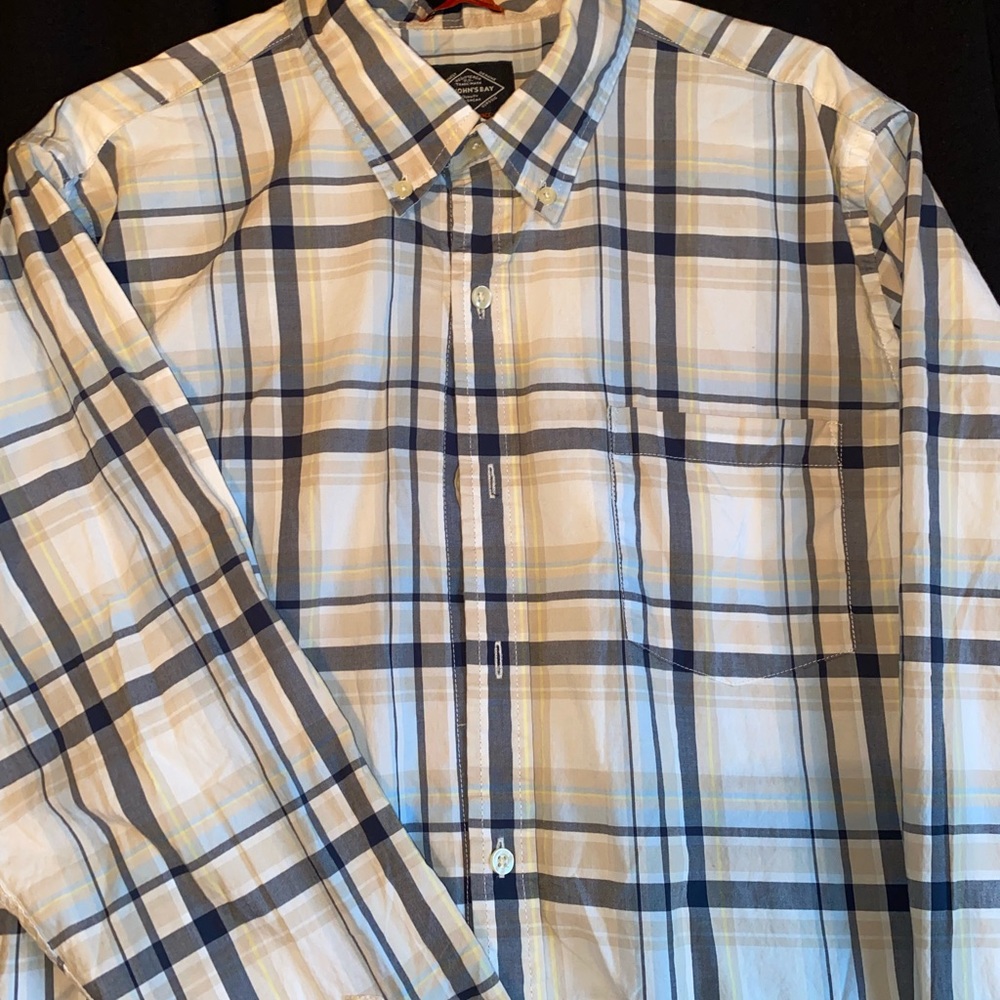 St. John’s bay mens plaid shirt has some teal, yellow tan grey in it.